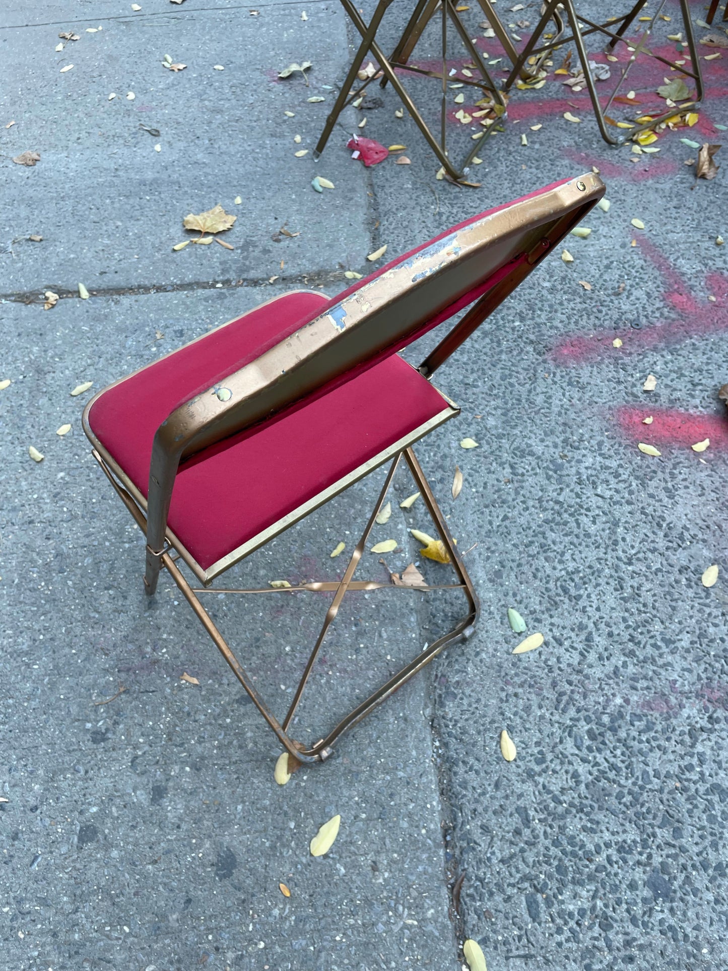 Pairs of Colorful Brass Folding Chairs