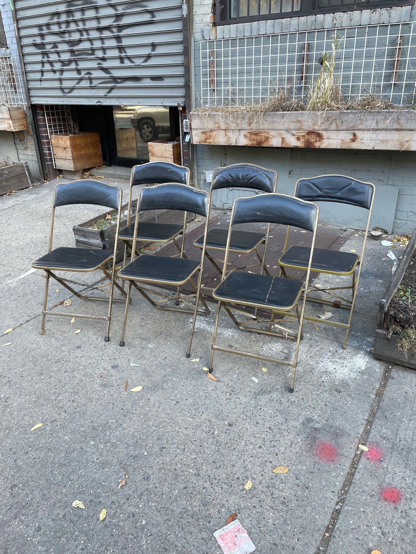 Pairs of Colorful Brass Folding Chairs