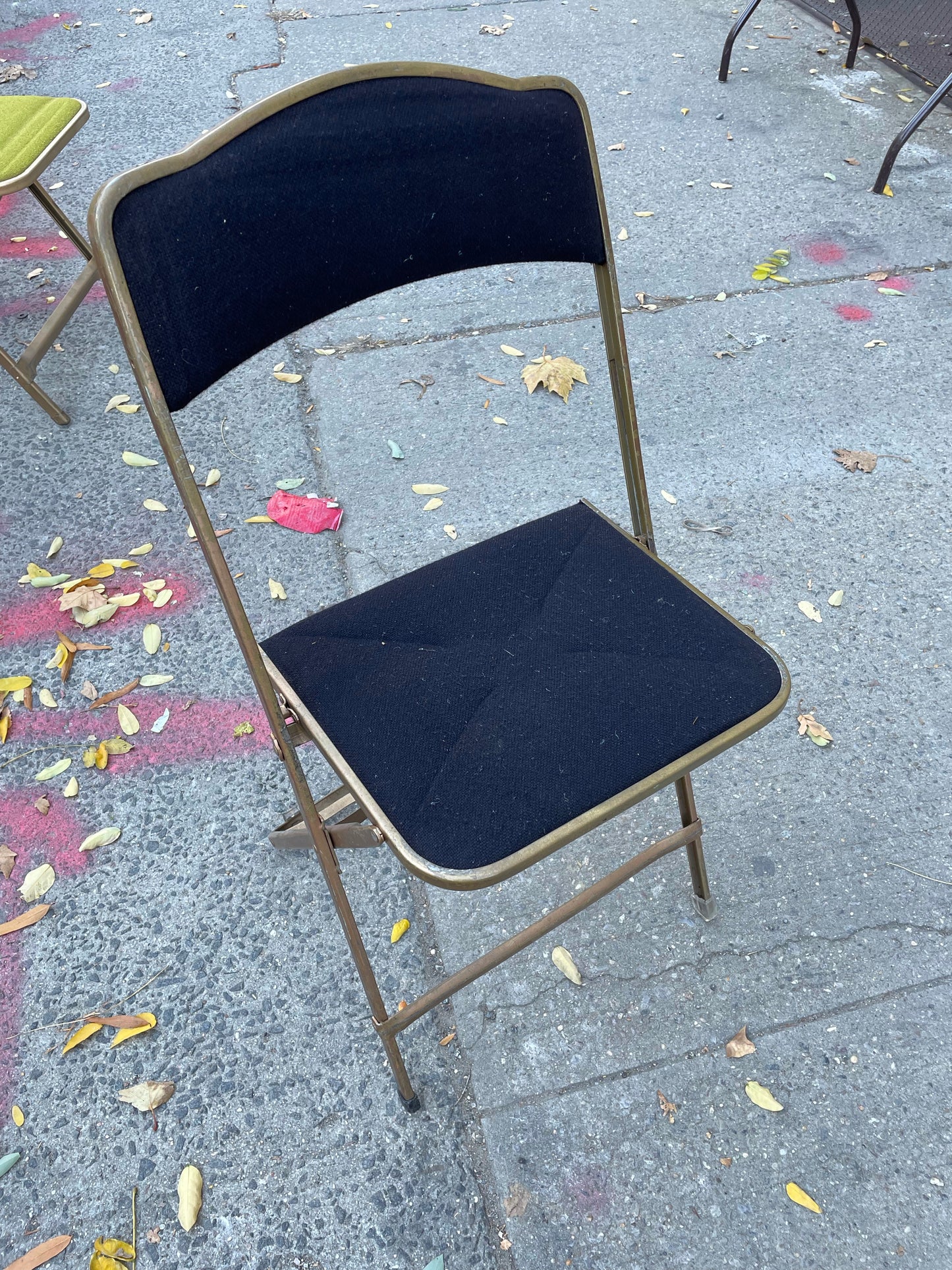 Pairs of Colorful Brass Folding Chairs