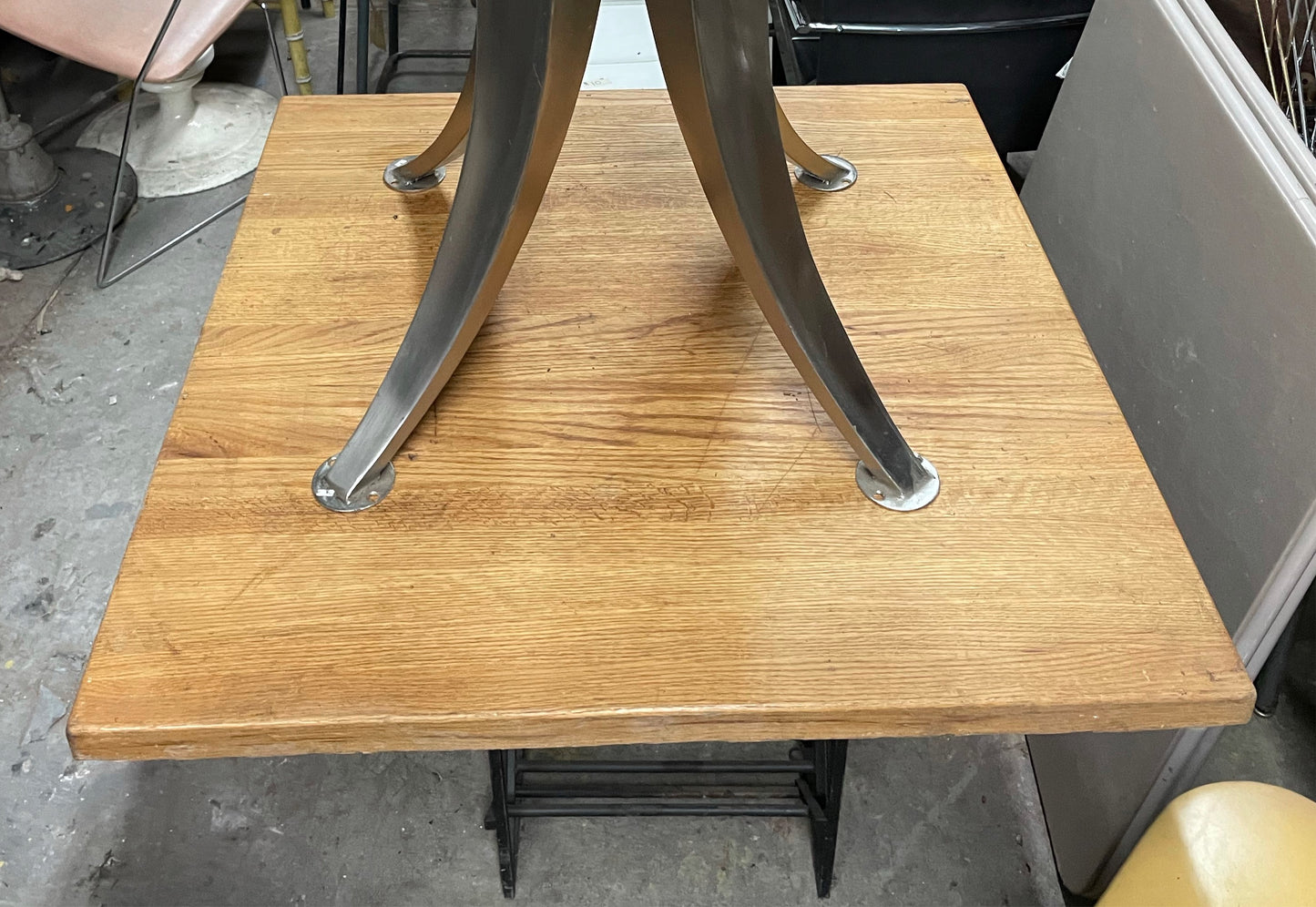 Square Butcher Block Dining Table on a Heavy Cast Iron Wine Rack Base