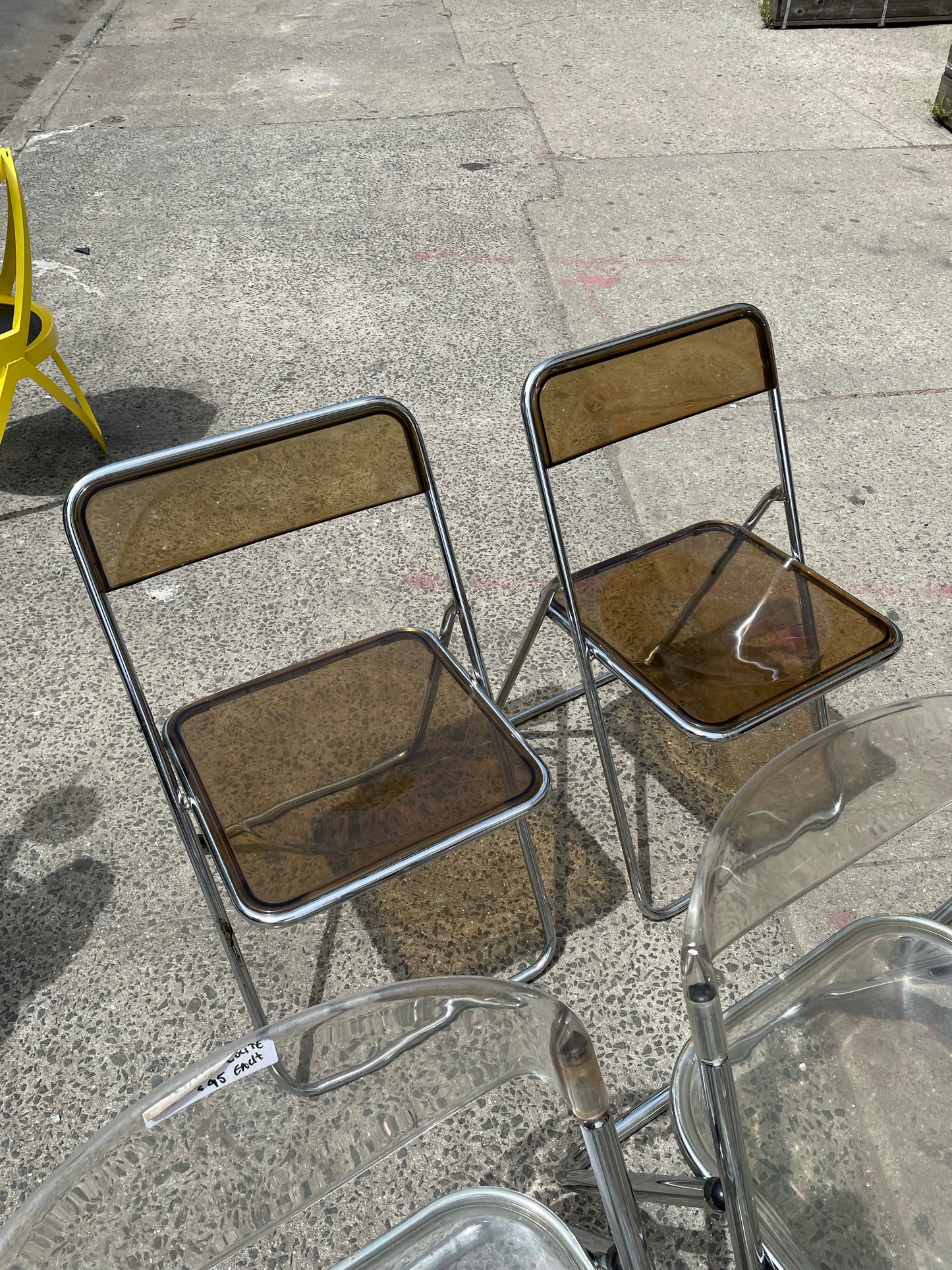 Pair of Smoked Lucite Folding Chairs