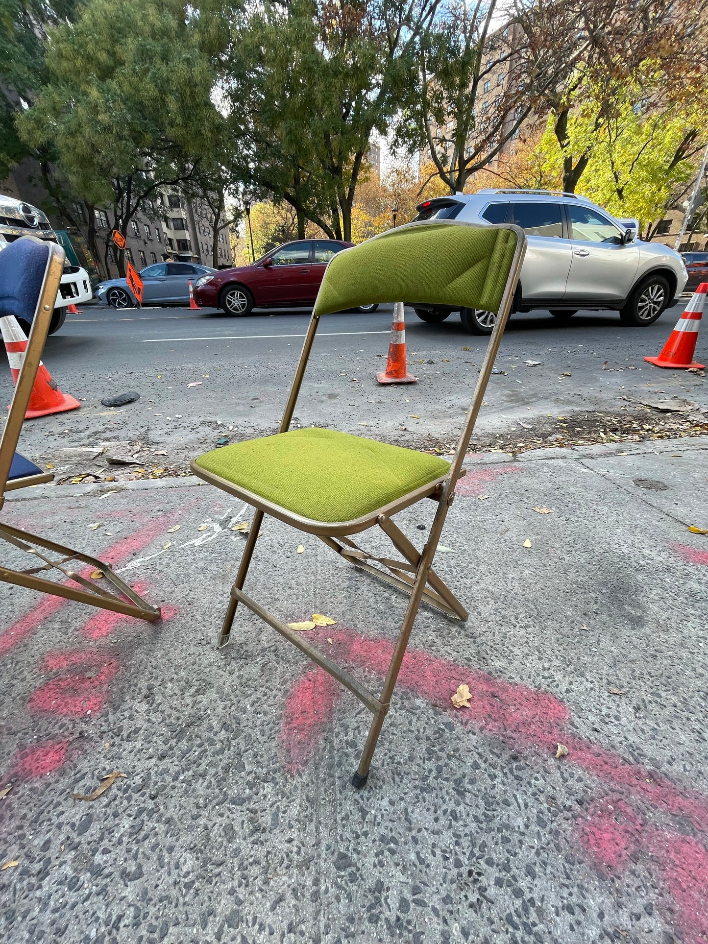 Pairs of Colorful Brass Folding Chairs