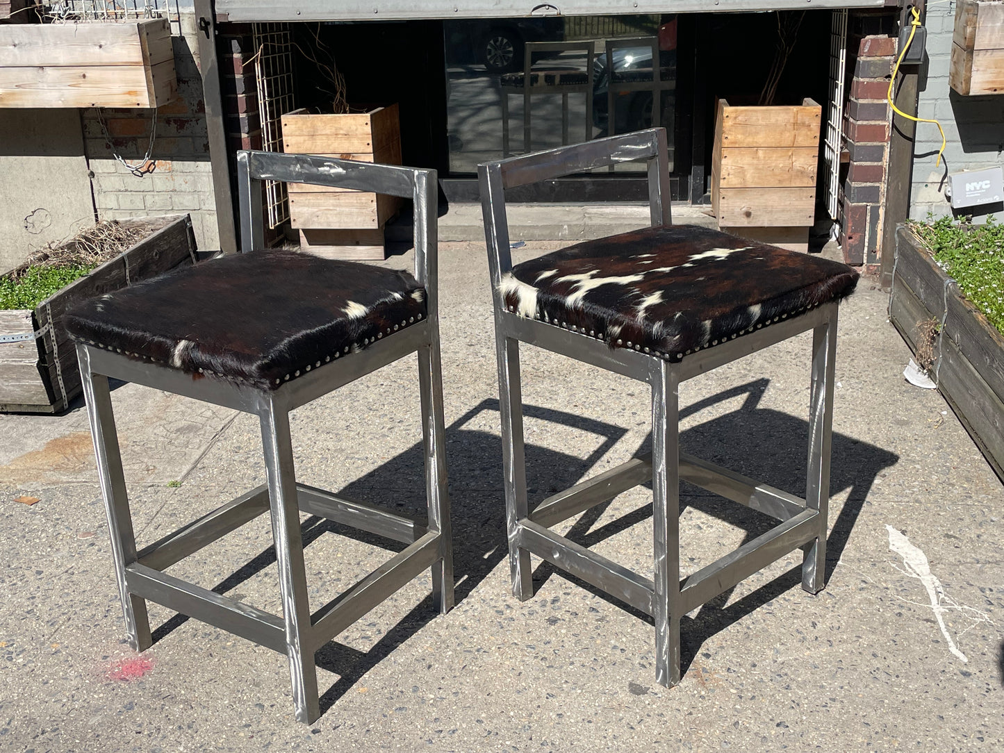 Pair of Steel and Pony Skin Counter Height Stools