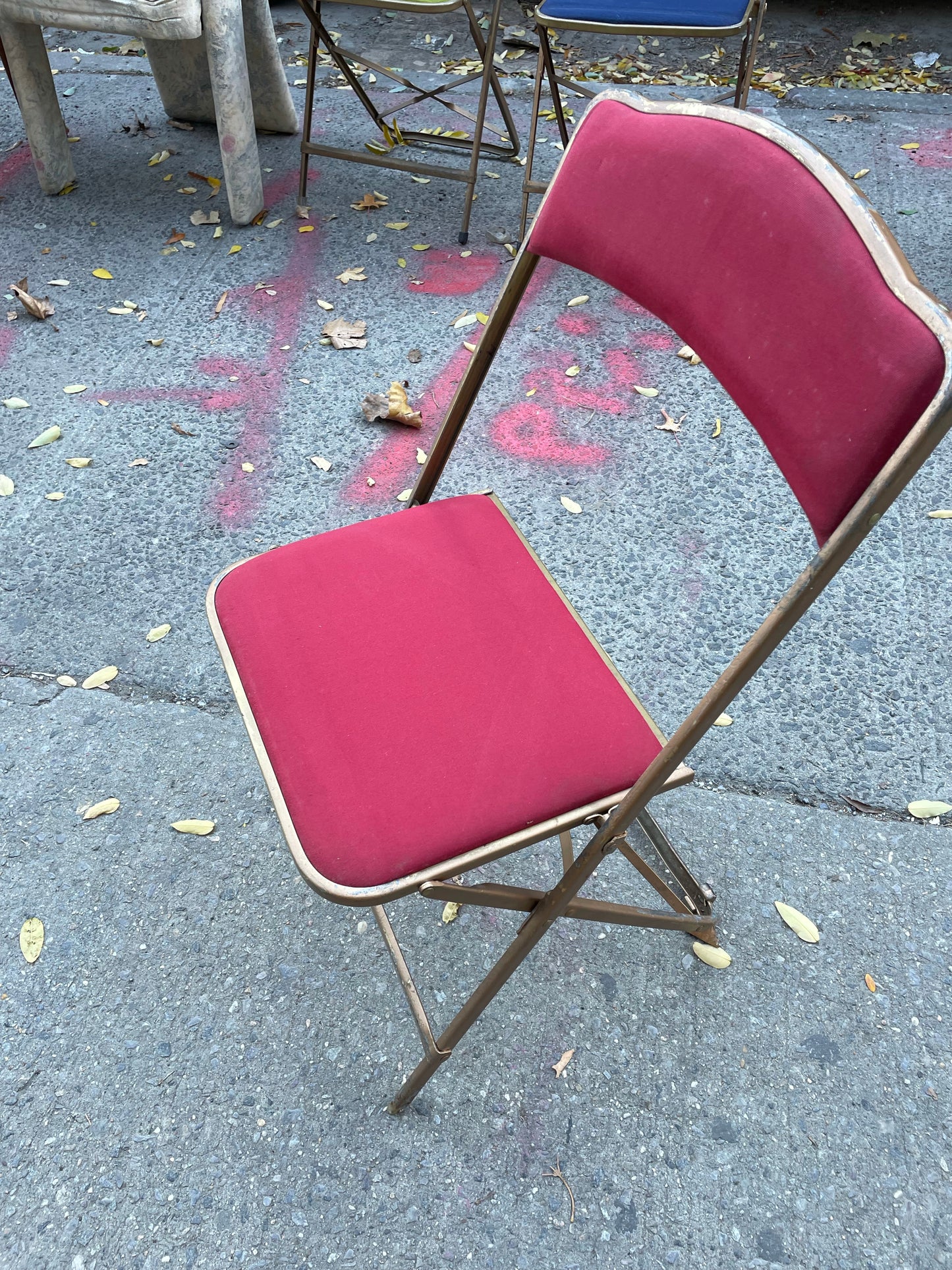 Pairs of Colorful Brass Folding Chairs