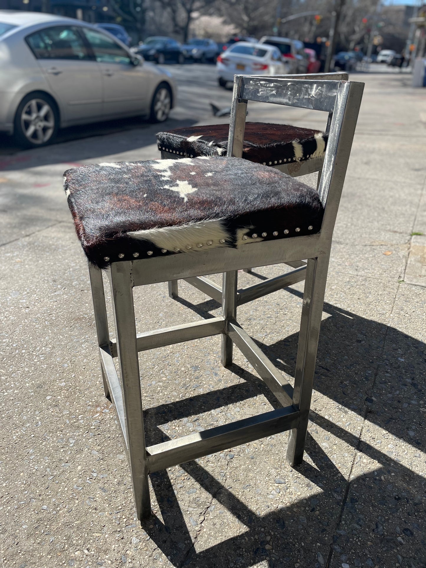 Pair of Steel and Pony Skin Counter Height Stools