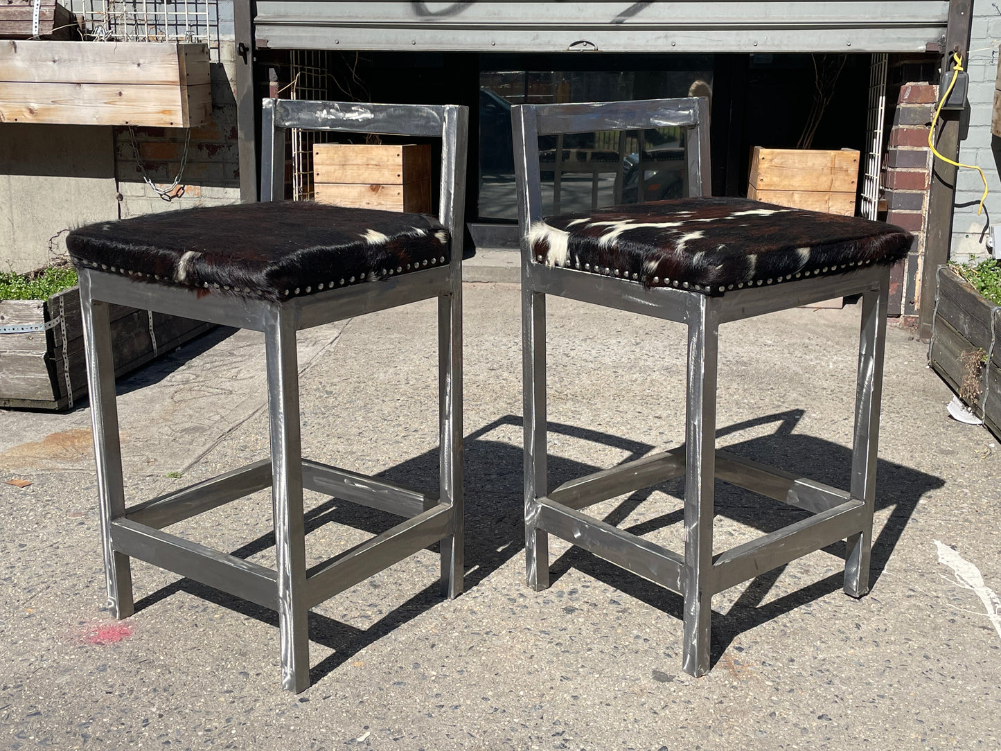 Pair of Steel and Pony Skin Counter Height Stools