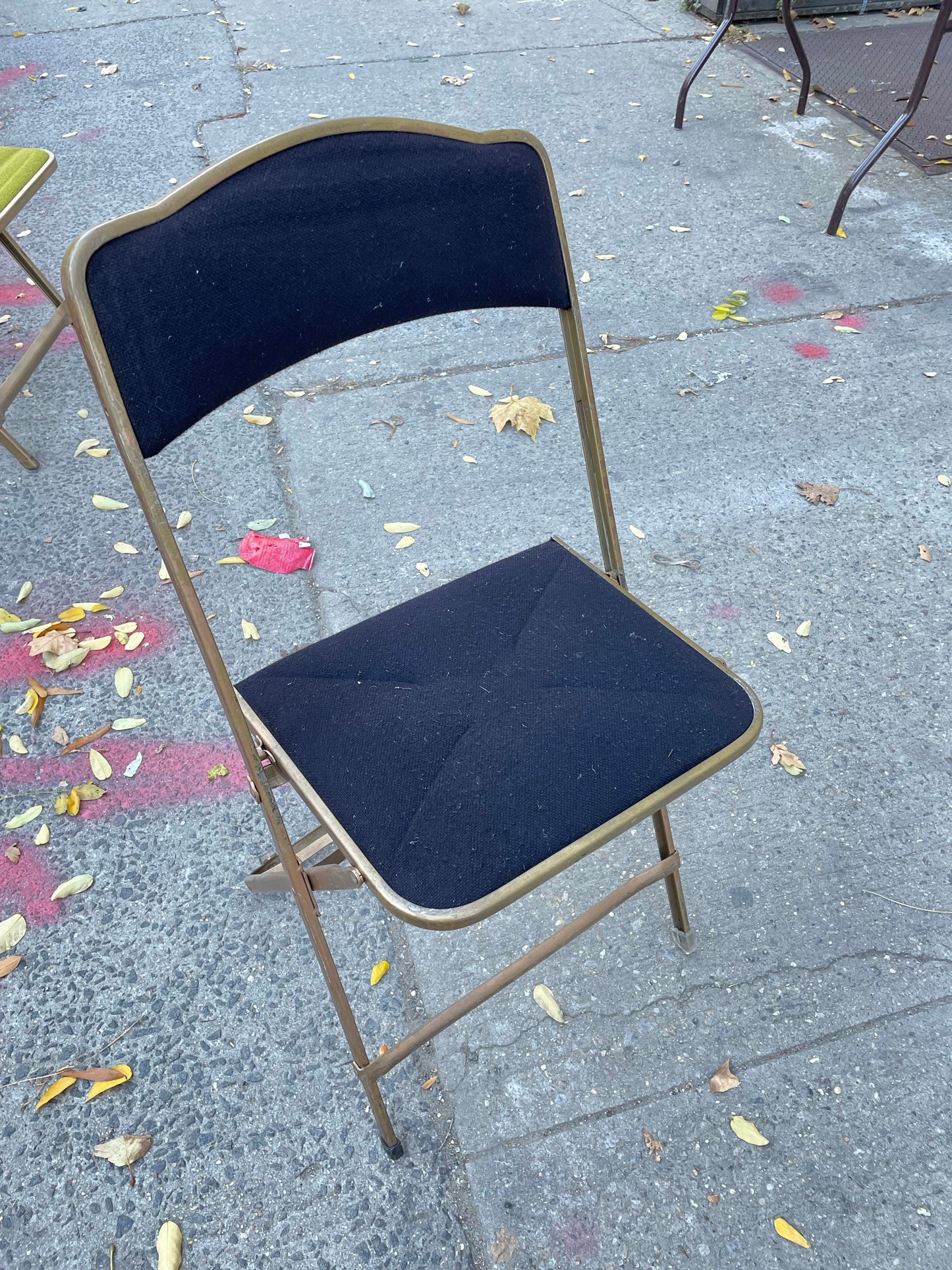 Pairs of Colorful Brass Folding Chairs