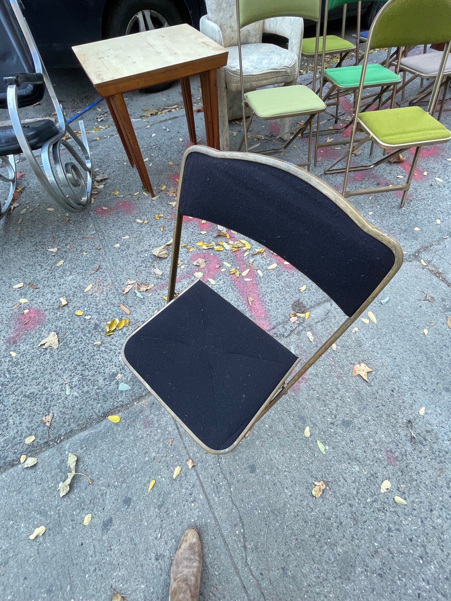 Pairs of Colorful Brass Folding Chairs