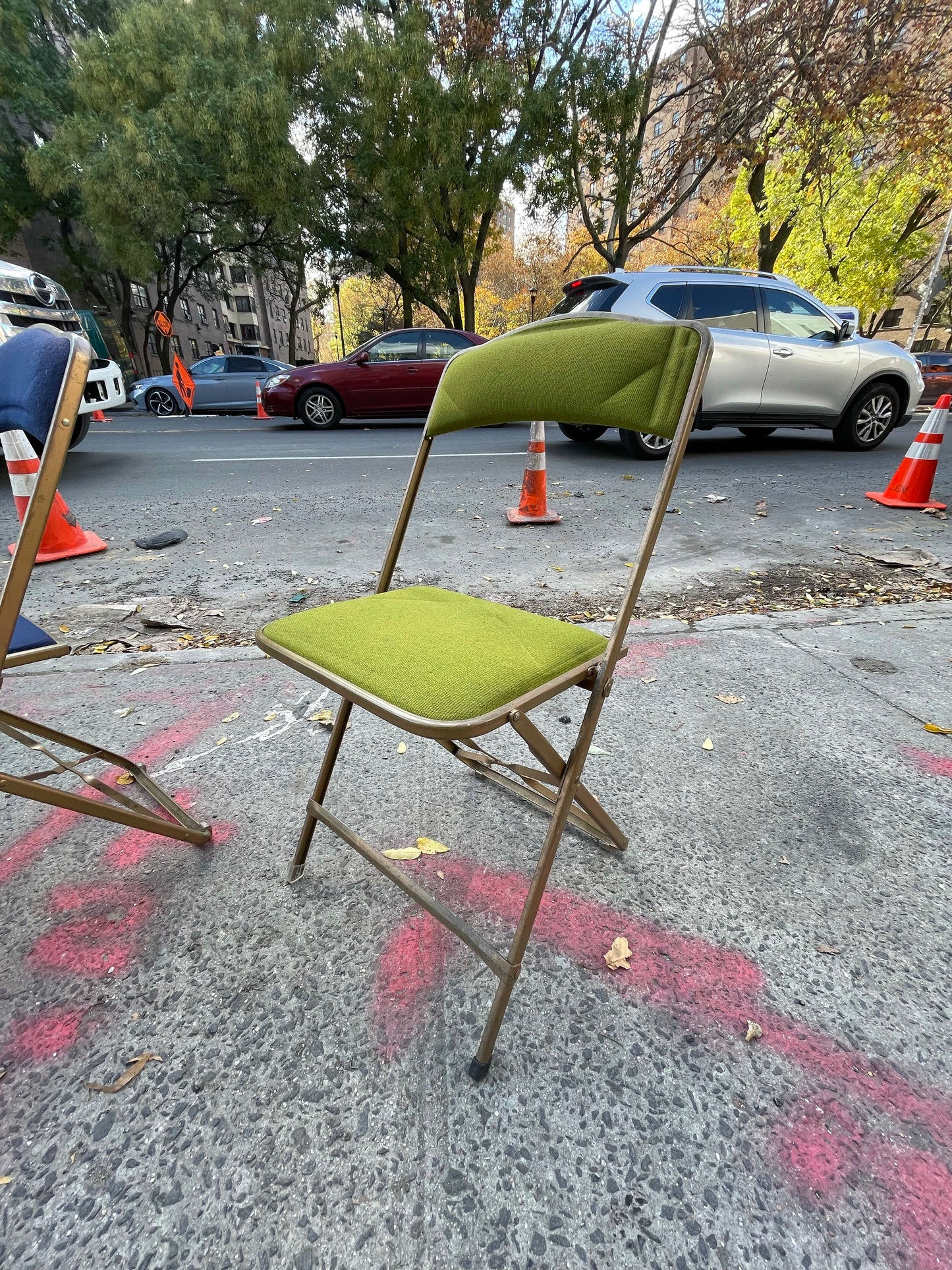 Pairs of Colorful Brass Folding Chairs