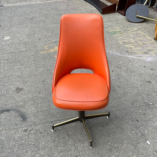 Pair of Orange Mid Century Swivel Chairs