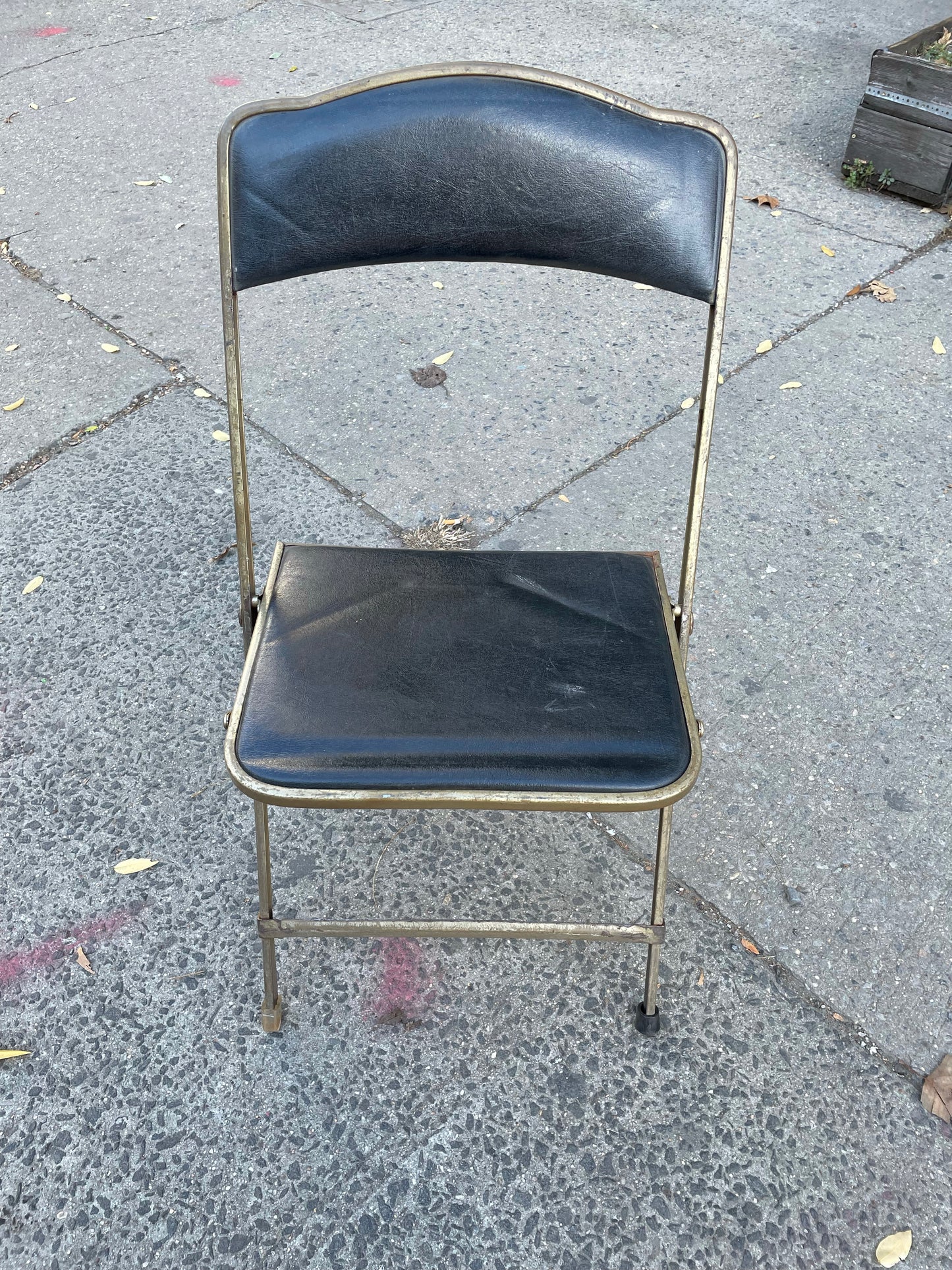 Pairs of Colorful Brass Folding Chairs